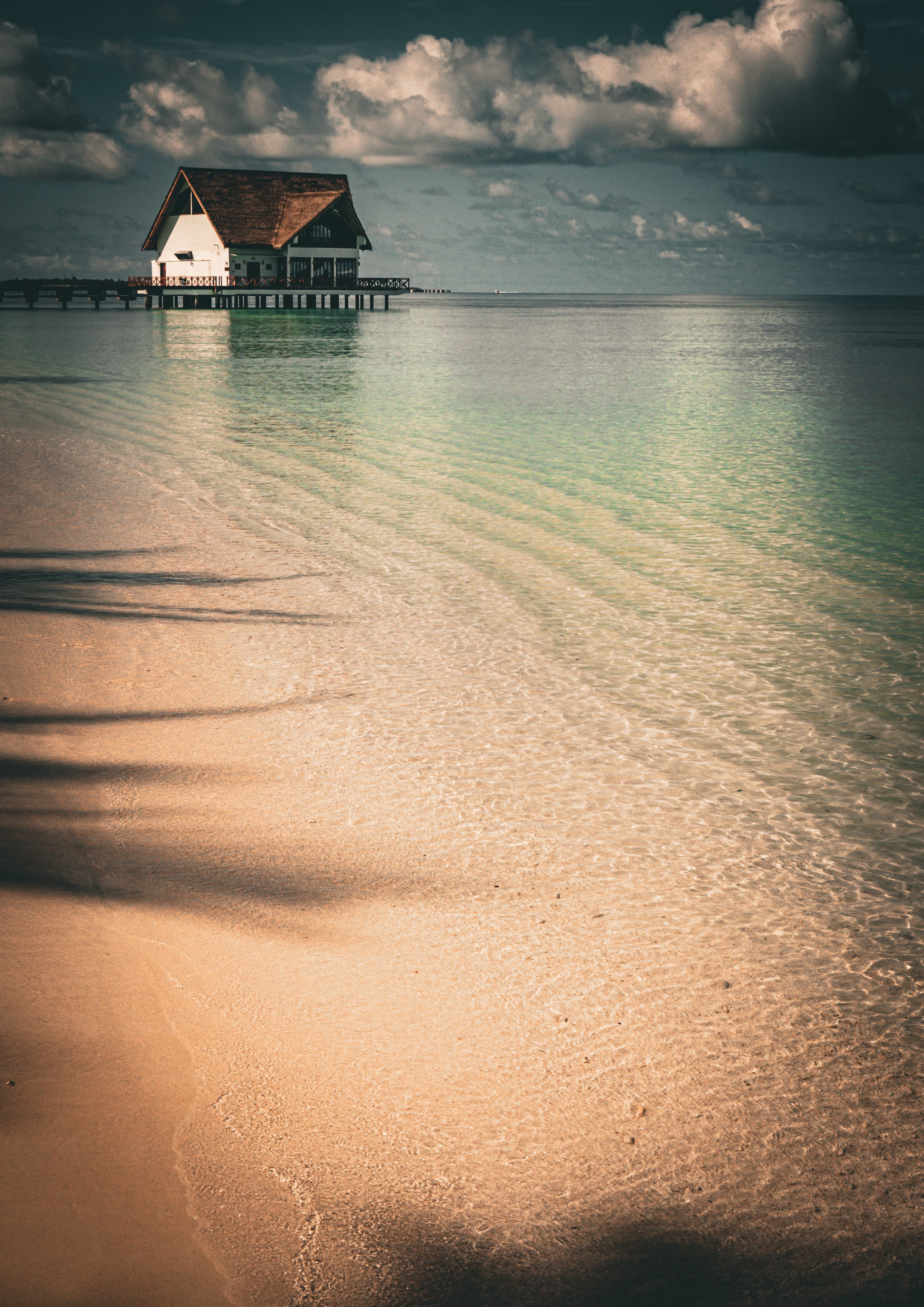 Shelter at the Water’s Edge, a fine art landscape photograph from Kooddoo, Maldives