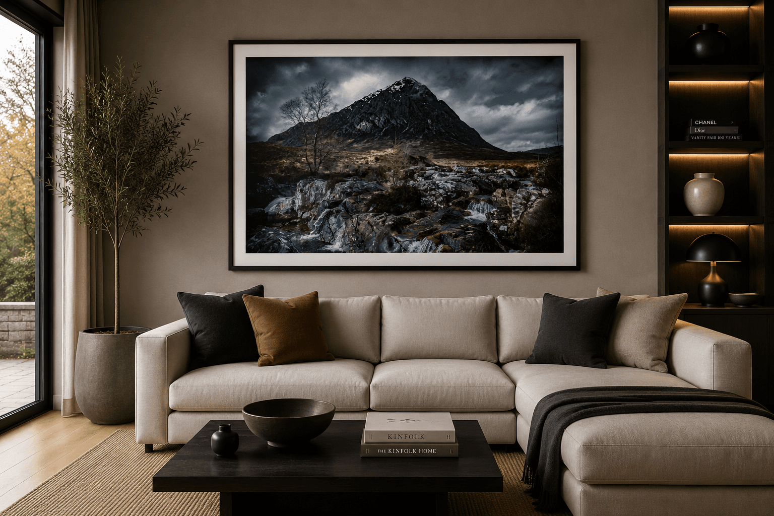 A landscape-format fine art photography print displayed above a sofa in a contemporary living room