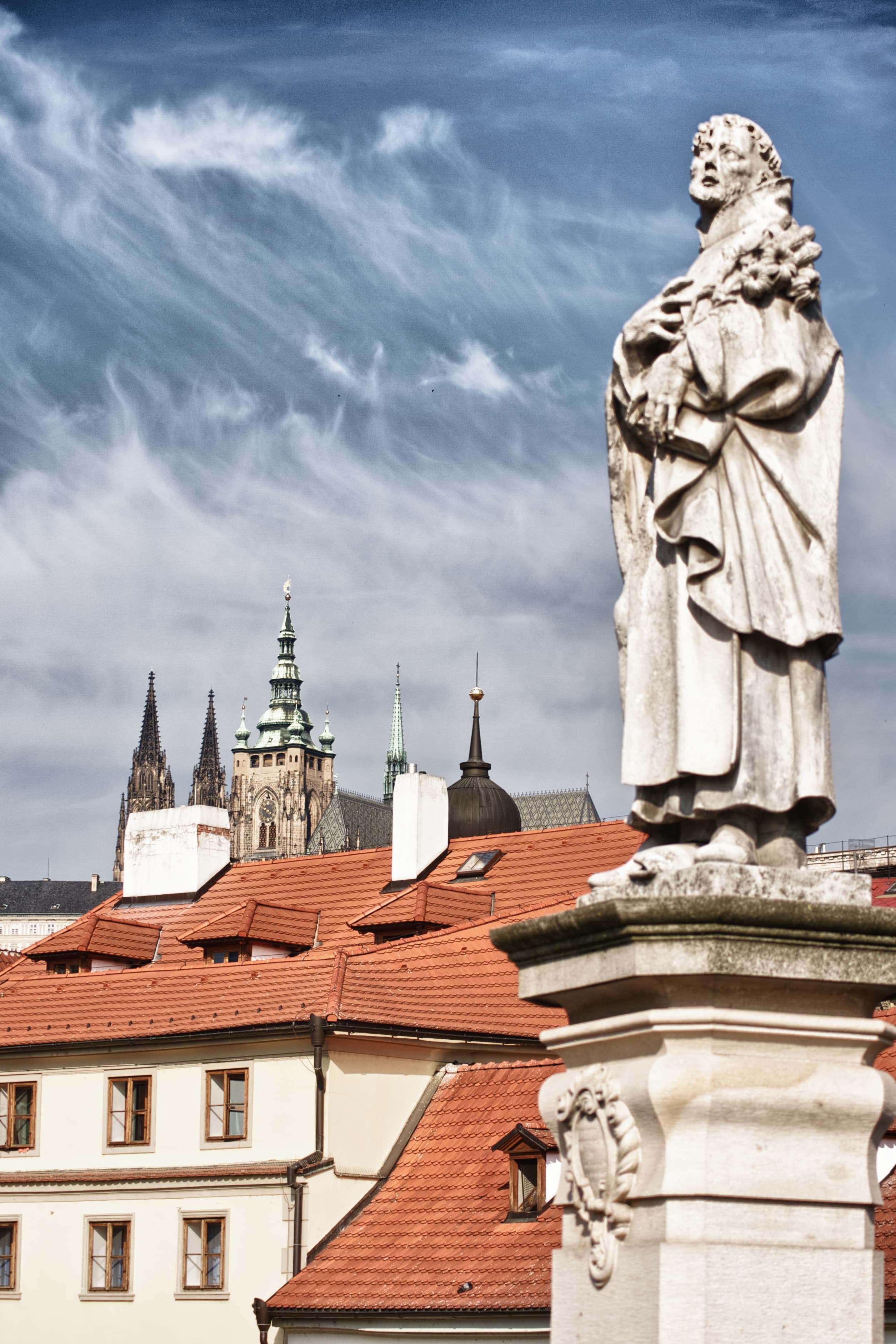 Saint Above the City, a fine art photograph from Malá Strana